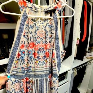 Mid spring/summer dress. Super cute with Jean jacket. Lightly worn